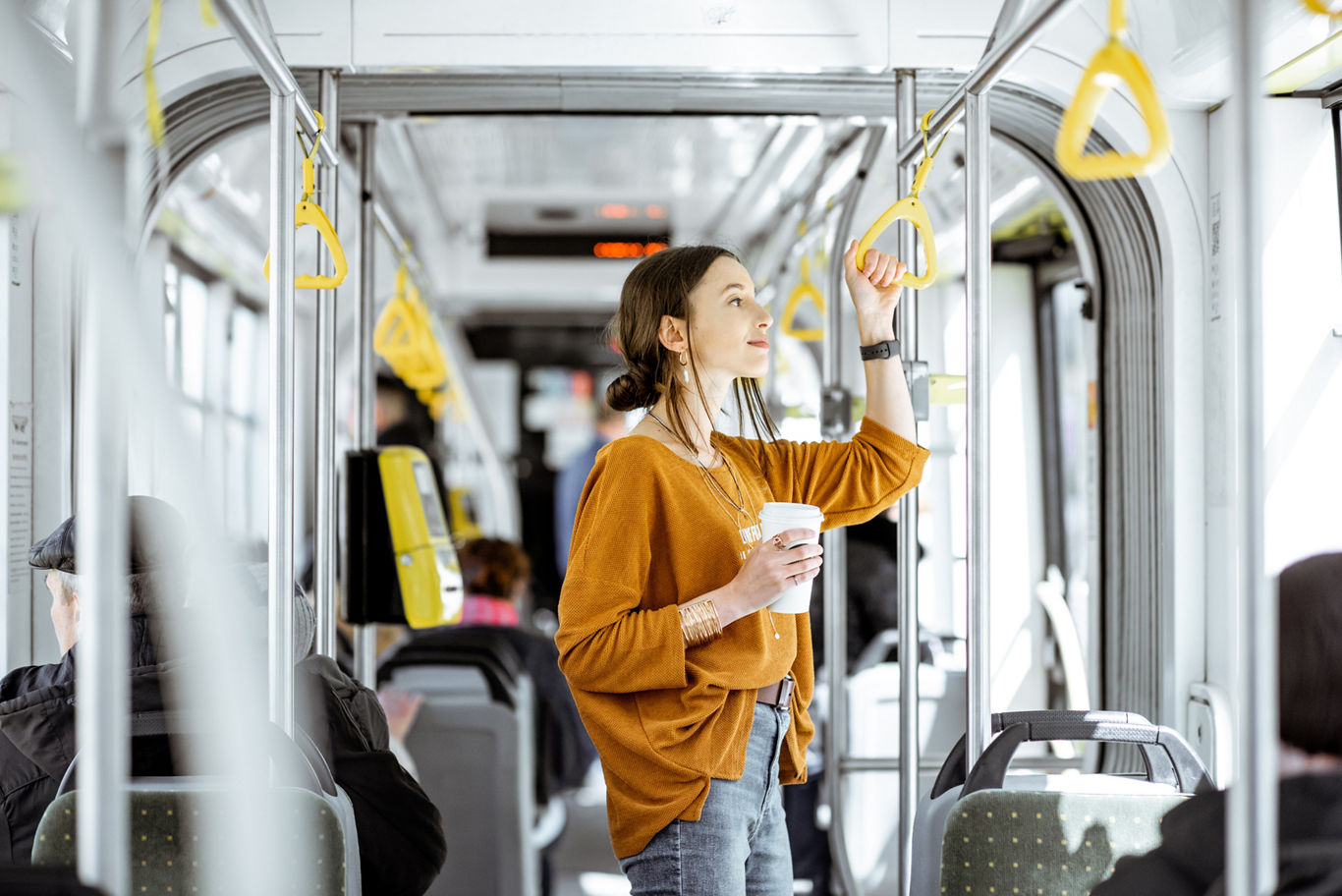 Woman Using Public Transportation | Blog | Greystar
